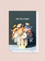 Say 'I love you a bunch' with this sweet floral-themed card! Perfect for anniversaries, Valentine's Day, or just because, this card is sure to make your special someone feel loved and appreciated.   10.5 x 14.8 cm (A6) Heavyweight 16pt paper stock Sustainably sourced paper Light satin finish, left uncoated on the inside for easier writing Envelope included  Blank inside