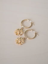 Gold-filled hoop earrings with sunflower charms 